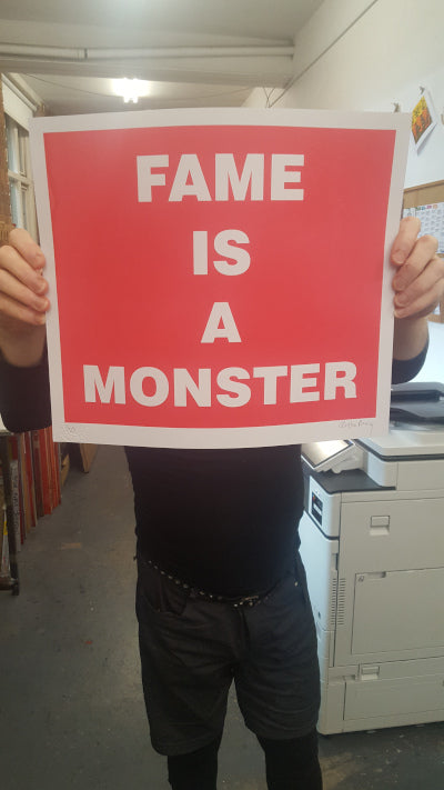 FAME IS A MONSTER (RED)